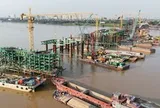 Cây cầu gần 8.000 tỷ đồng bắc qua sông Hồng, có vòm thép uốn lượn qua 6 nhịp, hiện có tiến độ ra sao sau hơn 8 tháng thi công?