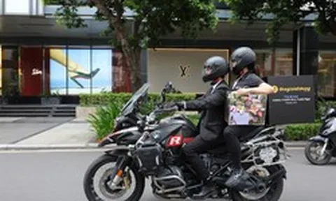 Chiêu marketing độc lạ của Thế Giới Di Động: Tung dàn 'shipper VIP' mặc vest đen đi giao điện thoại